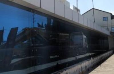 Industrial Property with Yard, Showroom, Offices, Store, and Workshop – Airport Road